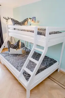 Ein Bett oder Betten in einem Zimmer der Unterkunft Ferienwohnung Wildfang