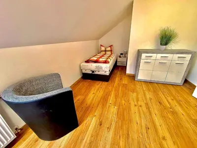 Ein Bett oder Betten in einem Zimmer der Unterkunft Ferien-Füchse Braunlage