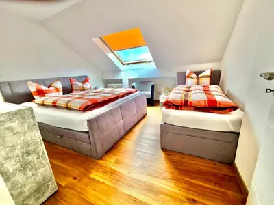 Ein Bett oder Betten in einem Zimmer der Unterkunft Ferien-Füchse Braunlage