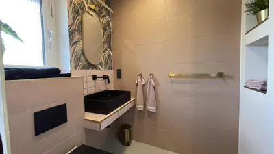 Ein Badezimmer in der Unterkunft Malis-Ferienhaus