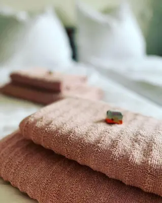 Ein Bett oder Betten in einem Zimmer der Unterkunft Malis-Ferienhaus