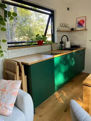 Küche/Küchenzeile in der Unterkunft Cozy Cabins I Tiny House Seecontainer