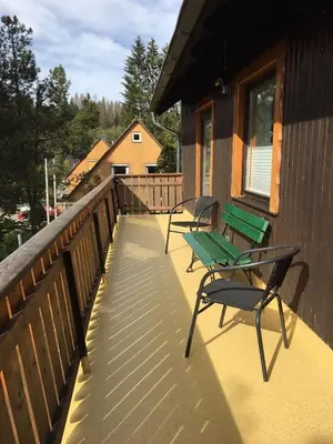 Ein Balkon oder eine Terrasse in der Unterkunft Ferienwohnung Momo . Villa Strawalde . Altenau/Oberharz
