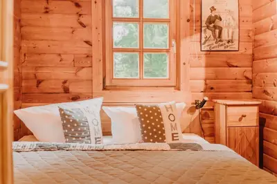 Ein Bett oder Betten in einem Zimmer der Unterkunft NEU! Komfort Ferienhaus Tannenrauschen