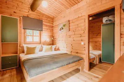 Ein Bett oder Betten in einem Zimmer der Unterkunft NEU! Komfort Ferienhaus Tannenrauschen