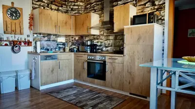 Küche/Küchenzeile in der Unterkunft Ferienwohnung Midgard im Sagenharz - Family-Apartment, 2 SZ & WLAN