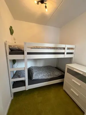 Ein Bett oder Betten in einem Zimmer der Unterkunft Ferienwohnung Dornröschen