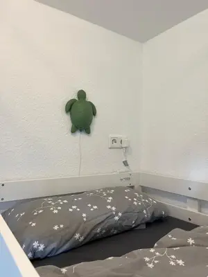 Ein Bett oder Betten in einem Zimmer der Unterkunft Ferienwohnung Dornröschen
