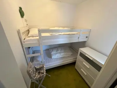 Ein Bett oder Betten in einem Zimmer der Unterkunft Ferienwohnung Dornröschen