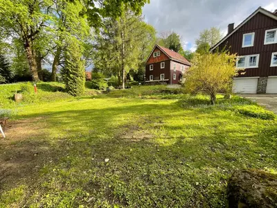 Ein Garten an der Unterkunft Liebevoll eingerichtetes Ferienzimmer mit großen Garten