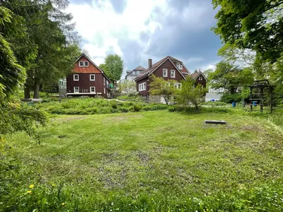 Ein Garten an der Unterkunft Liebevoll eingerichtetes Ferienzimmer mit großen Garten