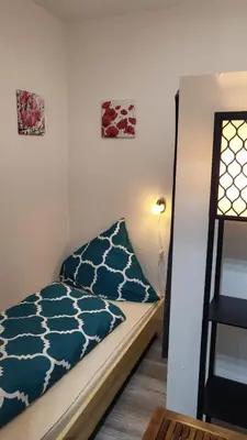 Ein Bett oder Betten in einem Zimmer der Unterkunft Ferienwohnung Marie-Luise Hahnenklee