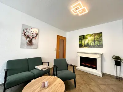Ein Sitzbereich in der Unterkunft Ferienwohnung Waldliebe