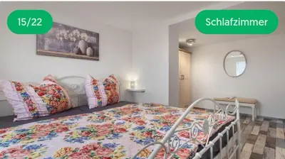 Ein Bett oder Betten in einem Zimmer der Unterkunft Schloßblick