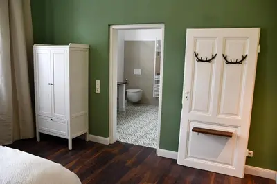Ein Badezimmer in der Unterkunft Ferienwohnung Villa Augusta-Bel Etage mit Infrarotkabine