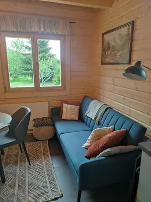 Ein Sitzbereich in der Unterkunft Ferienhaus Birkholz Harz