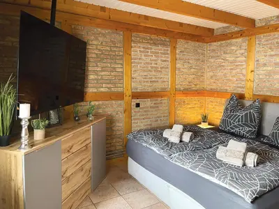 TV/Unterhaltungsangebot in der Unterkunft Ferienhaus Am Hang, Sky-Entertainment, DAZN, Carport, alles Barrierefrei