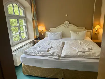 Ein Bett oder Betten in einem Zimmer der Unterkunft Hotel Bodeblick