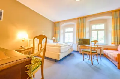 Ein Sitzbereich in der Unterkunft Hotel Bodeblick
