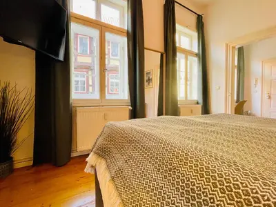 Ein Bett oder Betten in einem Zimmer der Unterkunft Fachwerkträume - 35m² Weltkulturerbe