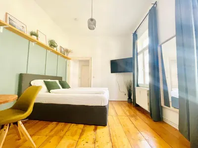 Ein Bett oder Betten in einem Zimmer der Unterkunft Fachwerkträume - 35m² Weltkulturerbe