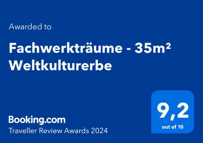 Ein Zertifikat, Auszeichnung, Logo oder anderes Dokument, das in der Unterkunft Fachwerkträume - 35m² Weltkulturerbe ausgestellt ist