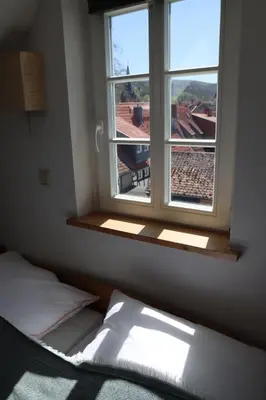 Ein Bett oder Betten in einem Zimmer der Unterkunft Ferienwohnung Am Westerntor 1