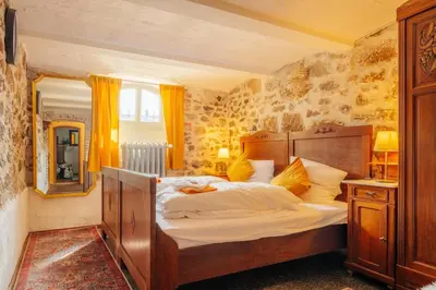 Ein Bett oder Betten in einem Zimmer der Unterkunft Villa im Harz - Deluxe Appartment - Frühstück, Halbpension buchbar