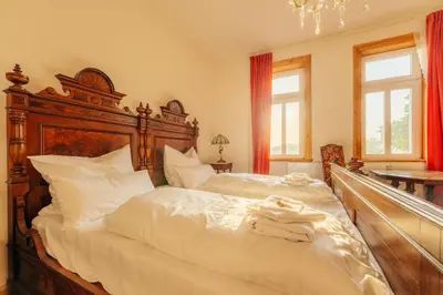 Ein Bett oder Betten in einem Zimmer der Unterkunft Unik Villa- Luxus FeWo im Oberharz