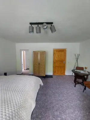 Ein Bett oder Betten in einem Zimmer der Unterkunft Pension Sternschnuppe, Treseburg Harz, unmittelbar am Wasser