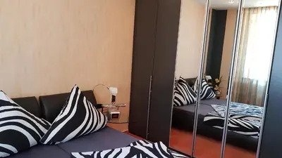 Ein Bett oder Betten in einem Zimmer der Unterkunft ALACARD Ferienwohnungen Höffgen Thale Harz