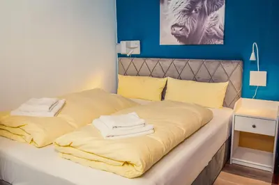 Ein Bett oder Betten in einem Zimmer der Unterkunft Hans im Harz