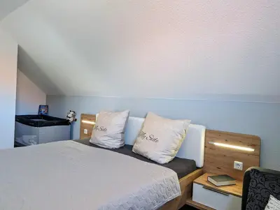 Ein Bett oder Betten in einem Zimmer der Unterkunft Premiumferienhaus Anni