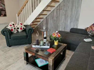 Ein Sitzbereich in der Unterkunft Premium-Plus-Ferienhaus Skadi I