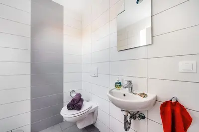 Ein Badezimmer in der Unterkunft Ferienhaus Arisa I