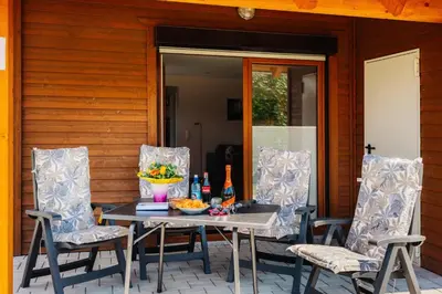 Ein Sitzbereich in der Unterkunft Ferienhaus Arisa III
