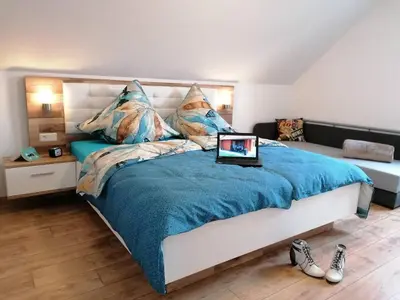 Ein Bett oder Betten in einem Zimmer der Unterkunft Ferienhaus Helene