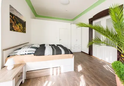 Ein Bett oder Betten in einem Zimmer der Unterkunft Ferienwohnung König