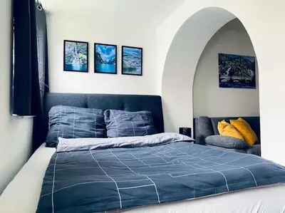 Ein Bett oder Betten in einem Zimmer der Unterkunft Ferienwohnung Villa Radau