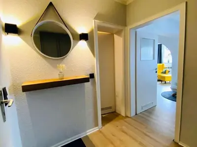 Ein Bett oder Betten in einem Zimmer der Unterkunft Ferienwohnung Villa Radau