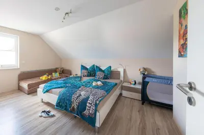 Ein Bett oder Betten in einem Zimmer der Unterkunft Ferienhaus Asgard
