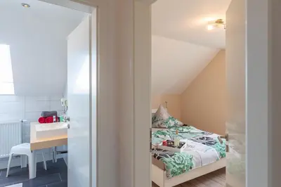 Ein Bett oder Betten in einem Zimmer der Unterkunft Ferienhaus Asgard