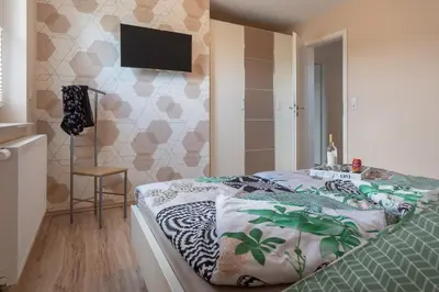 Ein Bett oder Betten in einem Zimmer der Unterkunft Ferienhaus Asgard