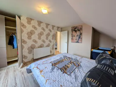Ein Bett oder Betten in einem Zimmer der Unterkunft Ferienhaus Ostara