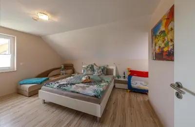 Ein Bett oder Betten in einem Zimmer der Unterkunft Ferienhaus Freya