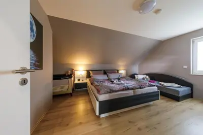Ein Bett oder Betten in einem Zimmer der Unterkunft Premiumferienhaus Lanai