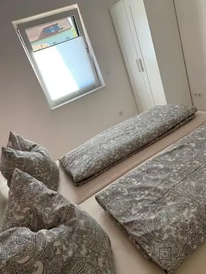 Ein Bett oder Betten in einem Zimmer der Unterkunft Ferienhaus Am Bodestein