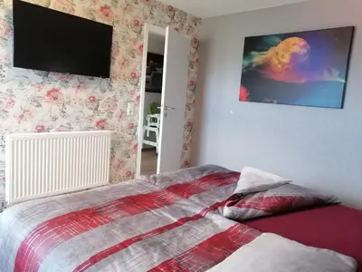 Ein Bett oder Betten in einem Zimmer der Unterkunft Premiumferienhäuser Agena & Ankaa