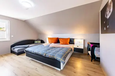 Ein Bett oder Betten in einem Zimmer der Unterkunft Premiumferienhaus Vanua
