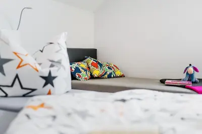 Ein Bett oder Betten in einem Zimmer der Unterkunft Ferienhaus Hödur